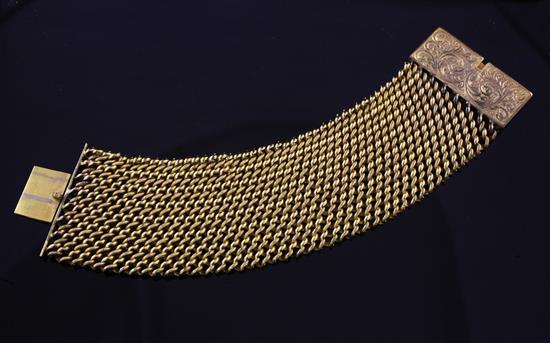 An early 19th century gilt metal mesh link bracelet, 6.75in.